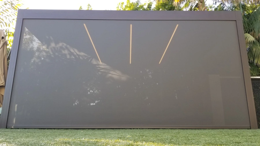Fully-lowered exterior roller shades provide privacy, shade, and insect control.