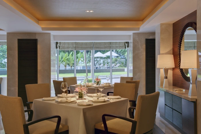 Roman shades in the dining room of an upscale hotel.