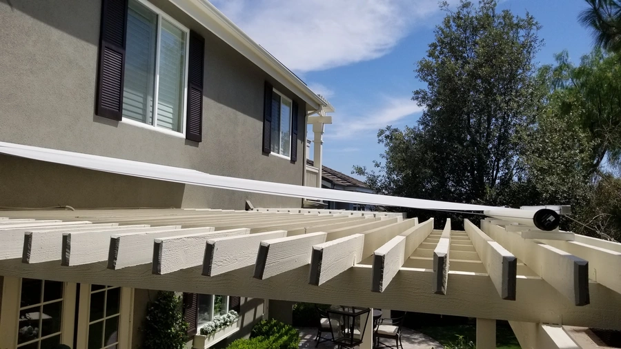 Exterior patio roller shade in Laguna Beach.