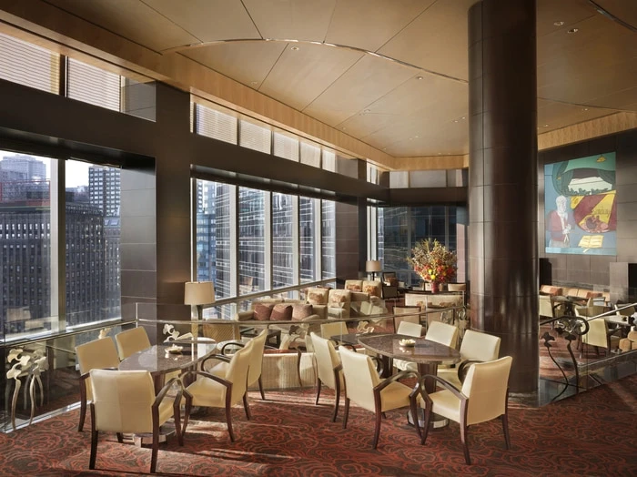 Roman shading system designed and built by Skyco in the dining room of the Mandarin Hotel.
