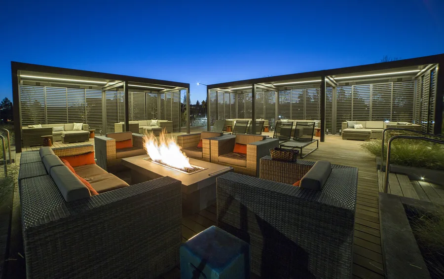 Five cabanas in Oregon, separated by custom wooden shutters.