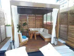 Hawaii-Outdoor-Lounge-Wood-Shutters.webp