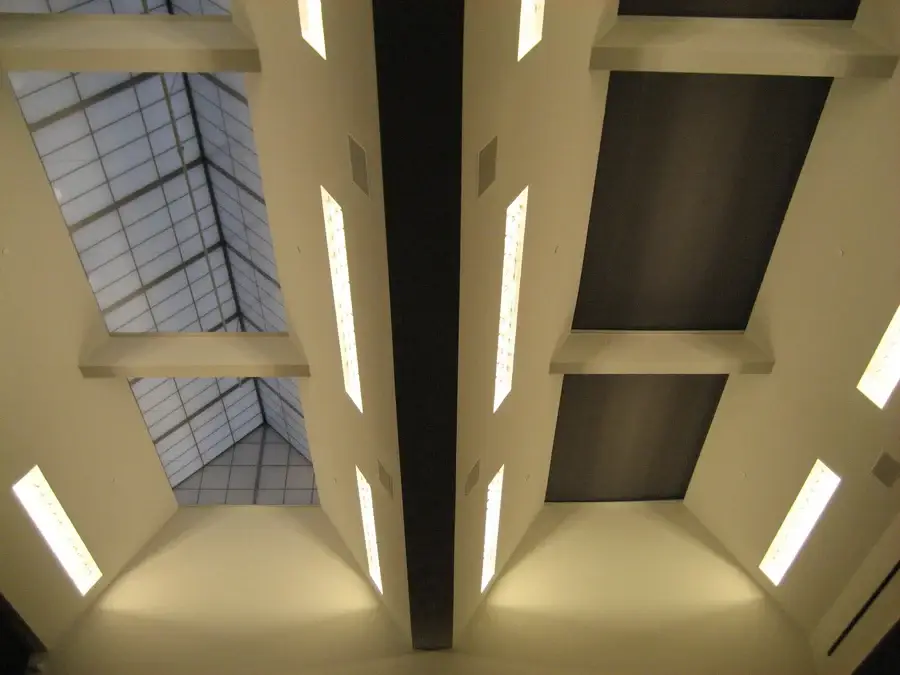 View from below a hotel's skylight. One of them has a custom shading system.