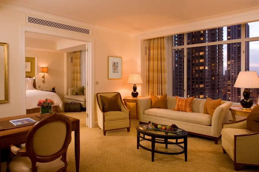 Chicago hotel suite with plaid drapes on the windows.
